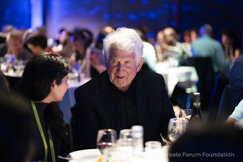 Metcalfe in a discussion with a young researcher